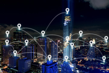Obraz na płótnie Canvas Map pin at smart city and wireless communication network, business district with office building, abstract image visual, internet of things concept