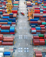 container ship in import export and business logistic.By crane ,Trade Port , Shipping.cargo to...