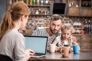 Young family in kitchen