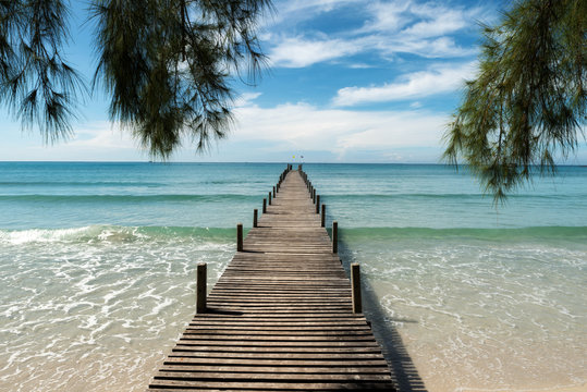 Fototapeta Wooden pier at resort in Phuket, Thailand. Summer, Travel, Vacation and Holiday concept.