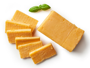 Cheddar cheese isolated on white background - obrazy, fototapety, plakaty