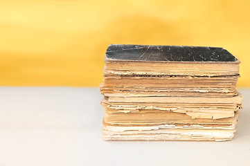 Old  books on a wooden table.