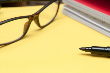 Fototapeta premium Office desk with notepad and copy space, modern layout