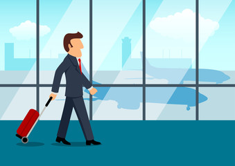 Businessman carrying a luggage at the airport