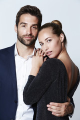 Loving couple posing for camera, portrait