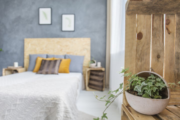 Bedroom with concrete wall