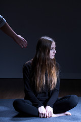Depressed girl rejecting help