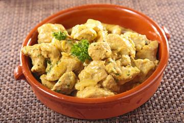 chicken cooked with curry and cream