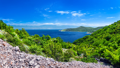 Fototapeta na wymiar Wonderful romantic summer afternoon landscape panorama coastline Adriatic sea. The magical clear transparent azure water in the bay. Krk island. Croatia. Europe.