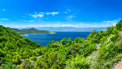 Obraz premium Wonderful romantic summer afternoon landscape panorama coastline Adriatic sea. The magical clear transparent azure water in the bay. Krk island. Croatia. Europe.