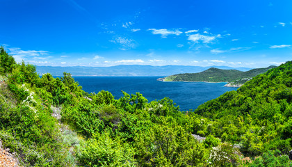 Obraz premium Wonderful romantic summer afternoon landscape panorama coastline Adriatic sea. The magical clear transparent azure water in the bay. Krk island. Croatia. Europe.