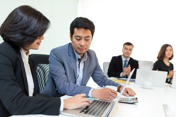 Business people working in conference room