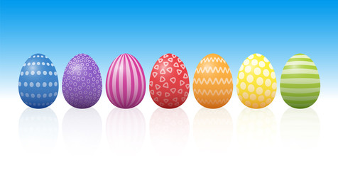 Easter eggs with different patterns and rainbow colors. Isolated three-dimensional vector illustration on blue to white background.