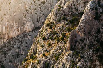 Large picture rocks in the rays of the setting sun.