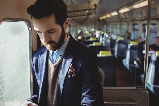 Businessman travelling in train