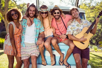 Group of friends having fun at music festival