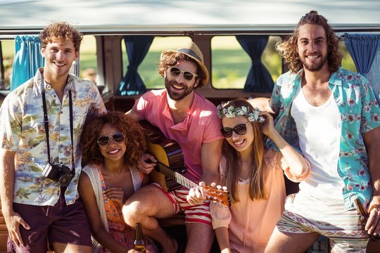 Group of friends having fun at music festival