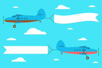 Flying planes with the banner on the background of clouds.
