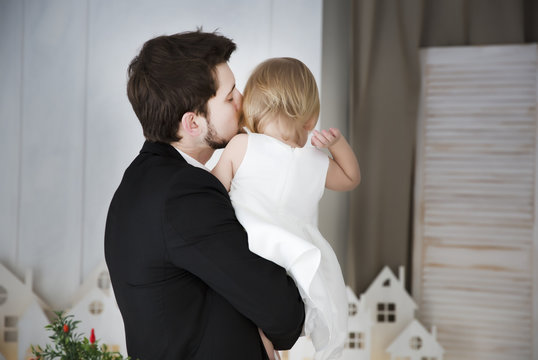 Little girl with young father