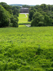 Green Rolling Hills and Manor House at Donneraille Park in Cork Ireland