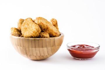 Fried chicken nuggets in bowl isolated on white background
