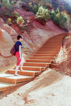 Woman in ocher fraction of Roussillon