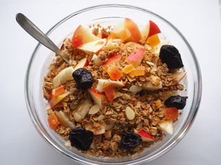 Healthy snack, fitness food, yogurt with musli and dried fruit, nutrition for weightloss, breakfast