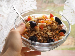 Healthy snack, fitness food, yogurt with musli and dried fruit, nutrition for weightloss, breakfast
