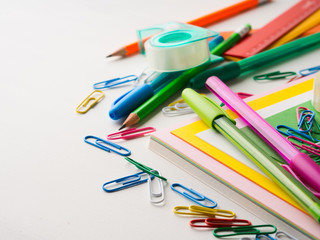 Stationery colorful writing tools accessories pens pencils, color paper. Back to school. Office supplies products