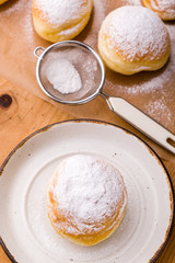 homemade donut with powder sugar