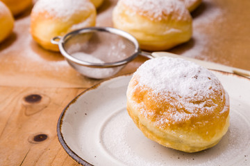 homemade donut with powder sugar