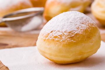 homemade donut with powder sugar
