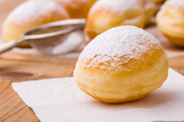 homemade donut with powder sugar