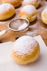 homemade donut with powder sugar