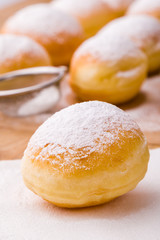 homemade donut with powder sugar