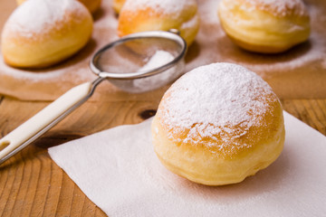 homemade donut with powder sugar