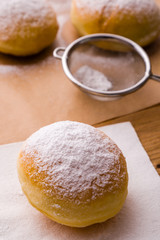 homemade donut with powder sugar