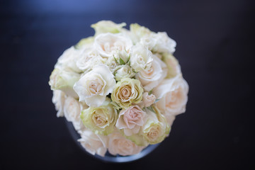 Bouquet of white/pink/light yellow wedding flowers 