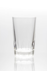 Empty glass of water isolated on a white background.