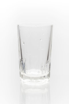 Empty glass of water isolated on a white background.