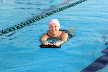 Middle Aged Woman in Swimming Pool