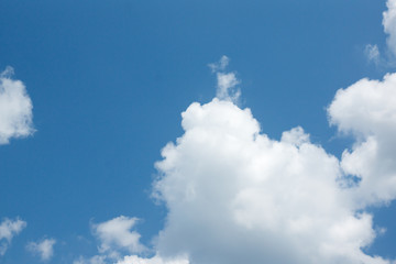 white clouds in the blue sky