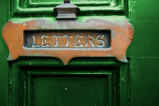 Letters Slot on Green Door