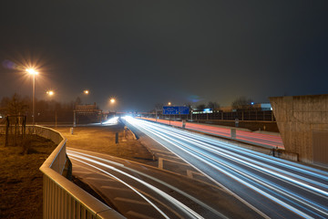 Highway at night with lighttrails