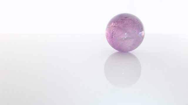 Mystical Pink Gem Stone Ball Isolated with a White Background