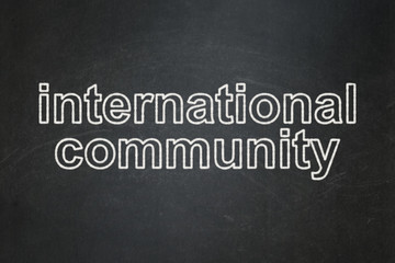 Fototapeta na wymiar Politics concept: International Community on chalkboard background