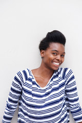 smiling african american woman against white background
