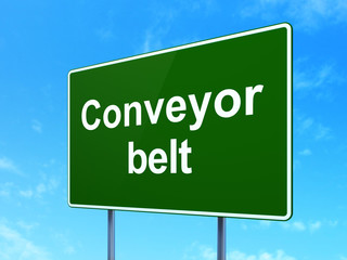 Industry concept: Conveyor Belt on road sign background