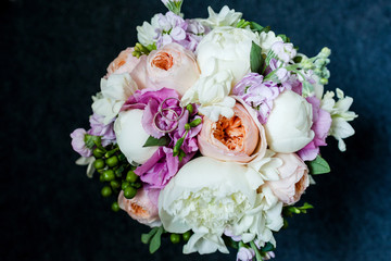 Wedding rings on the bouquet.
