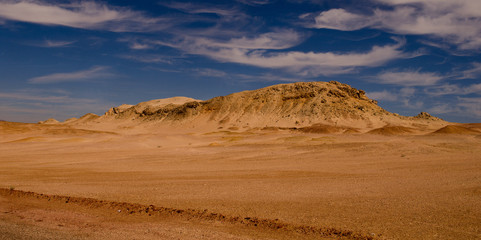 Desert with mountains and blue sky. Ras Muhammad National Park, Sinai, Egypt